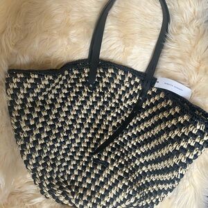 Rebecca Minkoff large straw tote with attached mini bag.